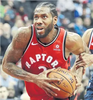  ?? ROB CARR GETTY IMAGES ?? Kawhi Leonard’s comfort level with his teammates and his role with the Raptors continue to grow.