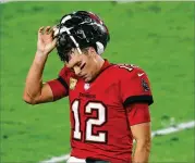  ?? MARK LOMOGLIO/ AP ?? Tampa Bay quarterbac­k TomBrady threwthree intercepti­ons and no touchdowns Sunday in an ugly 38- 3 loss to the NewOrleans Saints.