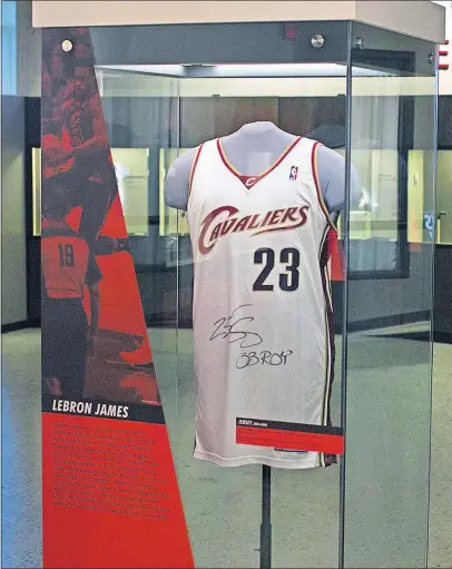  ?? [BROOKE LAVALLEY/DISPATCH] ?? A Cleveland Cavaliers jersey, worn by Lebron James during his rookie season in the NBA, is on display in the exhibit Ohio-champion of Sports at the Ohio History Center.