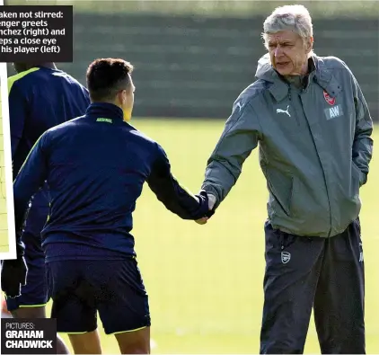  ??  ?? Shaken not stirred: Wenger greets Sanchez (right) and keeps a close eye on his player (left)