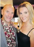  ??  ?? PMA Canada beverage agent Dave MacIntosh and Heather Mathieson toasted youthful guests at a recent launch of three new malt whiskies at the family-owned William Grant distillery.