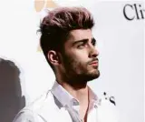  ?? John Salangsang/Associated Press ?? ZAYN MALIK Em março de 2015, o cantor e compositor inglês anunciou sua saída da boy band. Um ano depois, lançou seu primeiro trabalho solo, “Mind of Mine”, mostrando um caminho musical que mistura pop, eletrônica e R&B. Atualmente, ele está trabalhado...