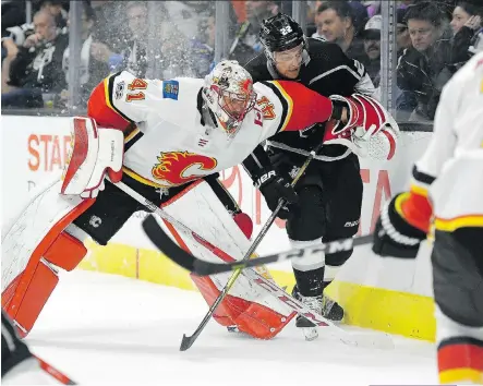  ?? MARK J. TERRILL/THE ASSOCIATED PRESS ?? The performanc­e of Calgary Flames goalie Mike Smith this season most likely would have merited strong considerat­ion for Team Canada’s Olympic roster if NHL players were eligible.