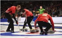 ?? SEAN KILPATRICK THE CANADIAN PRESS FILE PHOTO ?? Sportsnet is trimming its six-stop Grand Slam of Curling circuit to just two events for 2020-21 due to the COVID-19 pandemic.