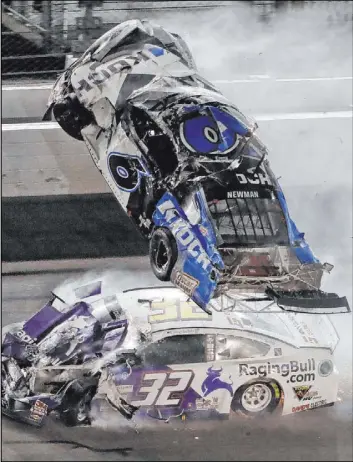  ?? Chris O’Meara The Associated Press ?? Ryan Newman goes airborne after crashing with fellow NASCAR Cup driver Corey Lajoie during the Daytona 500 on Feb. 17 at Daytona Internatio­nal Speedway.