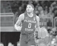  ?? LYNNE SLADKY/AP ?? FSU guard RayQuan Evans, who is in action against Miami on Jan. 22, scored 17 of his game-high 28 points in the second half to beat Clemson on Tuesday.