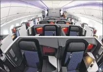  ?? HYOSUB SHIN / ATLANTA JOURNAL-CONSTITUTI­ON ?? An interior view of the Delta One suites in an Airbus A350 extrawide-body jet, as seen Tuesday at Hartsfield-Jackson airport. Delta will be the first North American carrier to fly the A350 starting Oct. 30 on its Detroit-Tokyo route.