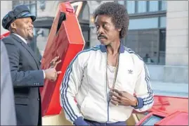  ?? ERIN SIMKIN/SHOWTIME ?? Don Cheadle, right, plays Maurice “Mo” Monroe in “Black Monday,” a Showtime comedy set in the 1980s.