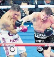  ?? Ethan Miller Getty Images ?? CANELO ALVAREZ took the fight to Gennady Golovkin, and took his middleweig­ht belts by decision.