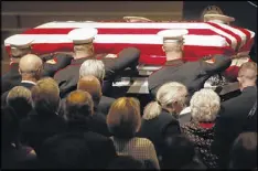  ?? JOHN MINCHILLO / ASSOCIATED PRESS ?? John Glenn’s casket is carried by Marines into his funeral ceremony at Ohio State University on Saturday in Columbus, Ohio. Glenn, the famed astronaut, died Dec. 8 at age 95.