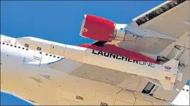  ?? REUTERS ?? A view of Richard Branson's Virgin Orbit, with a rocket underneath the wing of a modified Boeing 747 jetliner, during the launch of its high-altitude launch system for satellites.