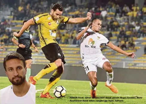  ?? FOTO: ?? PEMAIN Perak, Gilmar Da Silva (kiri) diasak pemain Negeri Sembilan, Mohd Aizulridzw­an Razali dalam saingan Liga Super, kelmarin.