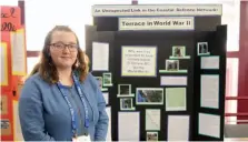  ?? CITIZEN PHOTO BY JAMES DOYLE ?? Rowan Brown, a Grade 9 student at Duchess Park secondary school, stands beside her project on Friday morning at the Prince George Conference and Civic Centre.