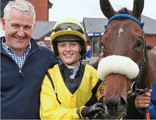  ??  ?? A winner born and bred: Ella McCain with dad Donald and Dark Confidant