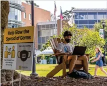  ?? ALYSSA POINTER / ALYSSA.POINTER@AJC.COM ?? Kennesaw State University freshman Kyle Johnson works with his laptop during the first day of classes Aug. 17 at KSU’s main campus in Kennesaw.