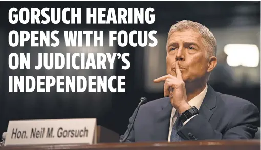  ?? JARRAD HENDERSON, USA TODAY ?? Appeals court Judge Neil Gorsuch testifiesM­onday before the Senate Judiciary Committee as his confirmati­on hearing began to fill the late Antonin Scalia’s seat. The committee is set to vote April 3 on Gorsuch’s nomination.