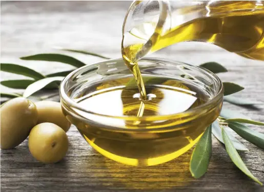  ?? STOCK.ADOBE.COM ?? Substituti­ng three-fourths of a tablespoon of olive oil daily for margarine, butter, mayonnaise and dairy fat was associated with 8% to 34% lower risk of multiple causes of death, research has found.