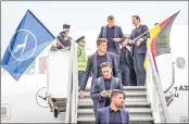 ??  ?? German team players disembark from a plane upon the team's arrival at the Vnukovo airport, outside Moscow, on Tuesday.