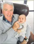  ?? Photos / Supplied ?? Robert Bartley holds his grandson, Chico Leguizamon.