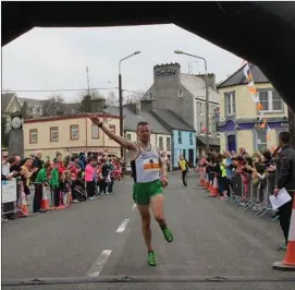  ??  ?? Emmett Dunleavy on his way to winning last year’s 10k run in Tubbercurr­y.