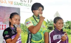 ??  ?? From left, Ainie, Dayang Ina Shazlyana and Gertrude with their winning medals.