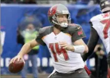  ?? ASSOCIATED PRESS ?? Tampa Bay Ryan Fitzpatric­k (14) looks to pass against the Giants in East Rutherford.