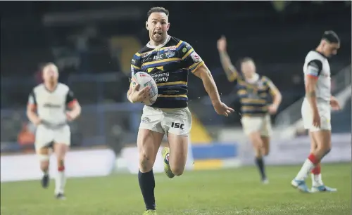  ?? PICTURE: JONATHAN GAWTHORPE ?? RACING CLEAR: Leeds Rhinos’ Luke Gale sprints clear of the Toronto Wolfpack defence to score a try in the second half at Headingley.