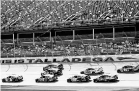  ?? JERRY MARKLAND/GETTY IMAGES ?? It was just practice on Friday, but things can get wild once the real Sprint Cup racing commences on Sunday when Dale Earnhardt Jr. seeks his 6th Cup victory at the track.