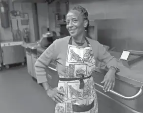  ?? MIKE DE SISTI / MILWAUKEE JOURNAL SENTINEL ?? Immy Kaggwa, chef-owner of Immy's African Cuisine, stands in her newly opened takeout kitchen inside a shared commercial kitchen at 8103 W. Tower Ave.