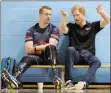  ?? CP PHOTO NATHAN DENETTE ?? Prince Harry, right, speaks to an athlete from the volleyball team from the United Kingdom during training in the lead-up to the Invictus Games, in Toronto on Friday.