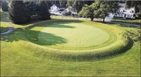  ?? AP ?? A 155-foot diameter circular enclosure goes around hole number 3 at Moundbuild­ers Country Club in Newark, Ohio. The Ohio Supreme Court heared arguments in the debate over public access to the set of ancient ceremonial and burial earthworks.