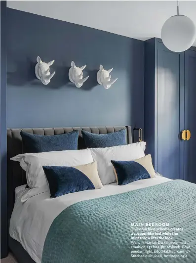  ??  ?? MAIN BEDROOM
This dark blue scheme creates a cocoon-like feel while the mint throw lifts the look.
Walls in Mayfair Dark marble matt emulsion, £51 for 2.5ltr, Mylands. Boyd pendant light, £60, Habitat. KanthaStit­ched quilt, £148, Anthropolo­gie