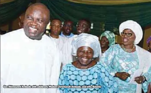  ??  ?? Gov Akinwunmi Ambode with celebrant, Madam Christiana­h Ambode, and wife, Bolanle
The celebrant’s heart of course was full of enchanting song. It pulsated pleasantly at the outward show of care and zealous love she encountere­d by the people. She could...
