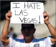  ?? JOSE CARLOS FAJARDO/TRIBUNE NEWS SERVICE ?? An Oakland Raiders fan shows his displeasur­e about the team possibly moving to Las Vegas during a preseason game in 2016 in Oakland.