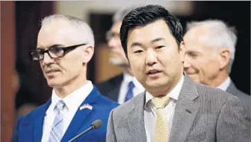  ?? Al Seib Los Angeles Times ?? L.A. COUNCILMAN David Ryu, right, co-authored a proposal six months ago to ban campaign donations by developers seeking city approvals. It’s yet to have a hearing, but Ryu “has faith” it will soon, a policy aide said.