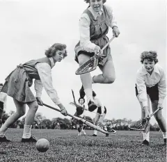  ??  ?? Spiffing! Schoolgirl­s playing lacrosse in the Fifties