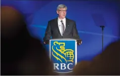  ?? CP PHOTO GRAHAM HUGHES ?? Royal Bank of Canada President and CEO David McKay addresses shareholde­rs during the bank’s annual general meeting in Montreal on Wednesday.