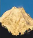  ?? FOTO: DPA ?? Majestätis­cher Achttausen­der: der Manaslu im Himalaya, einer der höchsten Berge der Welt.