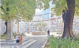  ?? ?? Two fountains from the Spanish era are still found on either end of Binondo Plaza.