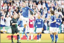  ?? (AP) ?? Leicester City’s Jamie Vardy celebrates scoring his side’s first goal of the game against Burnley during their English Premier League soccer match at
the King Power Stadium in Leicester, England on Oct 19.