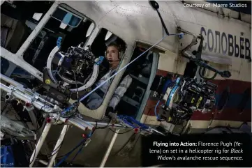  ??  ?? Courtesy of Maere Studios
Flying into Action: Florence Pugh (Yelena) on set in a helicopter rig for Black Widow's avalanche rescue sequence.