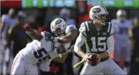  ?? BILL KOSTROUN - THE ASSOCIATED PRESS ?? New York Jets quarterbac­k Josh McCown (15) rolls out of the pocket during the first quarter of an NFL football game against the Buffalo Bills, Sunday, Nov. 11, 2018, in East Rutherford, N.J.