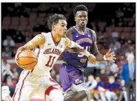  ?? AP/SUE OGROCKI ?? Oklahoma guard Trae Young (11) tied an NCAA Division I record with 22 assists in Oklahoma’s 105-68 victory over Northweste­rn State on Tuesday night.