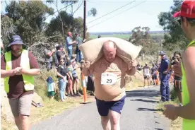  ?? Photograph: Tim McGlone/The Guardian ?? Chris Russell completed his fifth King of the Hill event on Mount Wycheproof at the weekend, 35 years after the last.