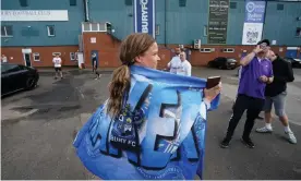  ??  ?? Supporters gather outside Gigg Lane after Bury’s expulsion from the Football League in 2019. Bury AFC hope eventually to be able to buy back the ground. Photograph: Jon Super/ The Guardian