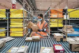  ?? Gianni Cipriano / New York Times file photo ?? The scale of Amazon’s hiring is even larger than it may seem because the numbers don’t account for employee churn or temporary holiday workers.