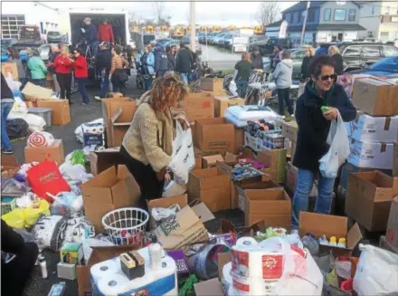  ?? PETE BANNAN – DIGITAL FIRST MEDIA ?? Hundreds of volunteers collected items for victims of the fire at Barclay Friends senior home on Sunday at GoodWill Fire Company. Almost 200residen­ts of the senior living community were displaced after the building caught fire late Thursday evening.