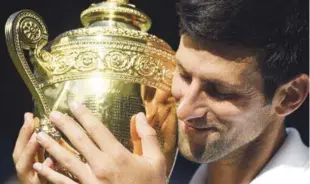  ?? MIMIM ?? Campeón. Novak Djokovic logró ganar por cuarta vez en el Abierto de Wimbledon.