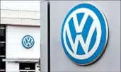  ?? PAUL J. RICHARDS/GETTY-AFP 2015 ?? Volkswagen must spend up to $10 billion to buy back or repair vehicles’ engines and pay their owners an additional $5,100 to $10,000 each, according to the settlement.