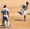  ?? K.C. ALFRED U-T ?? Padres’ Jake Cronenwort­h rounds the bases after hitting a homer in the fourth inning.